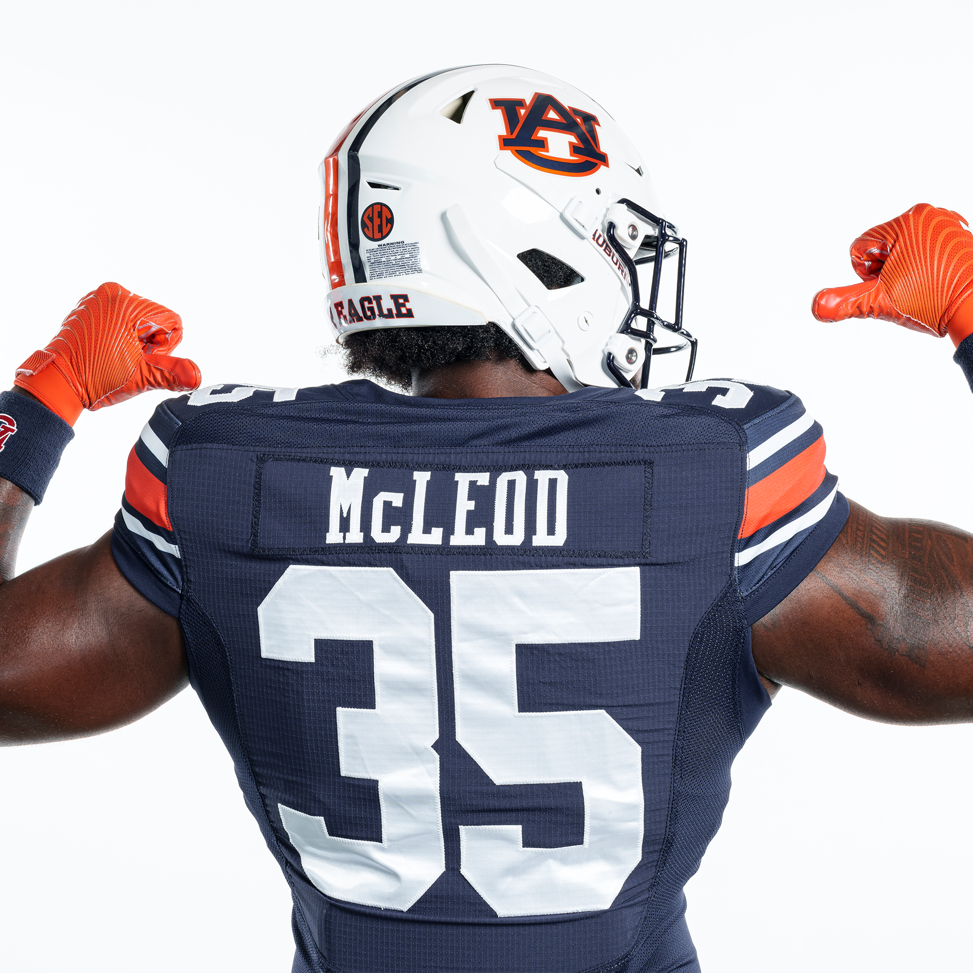 Jalen McLeod posing in the new Under Armour uniform template. Details of the template and changes are detailed on the Auburn Uniform Database.