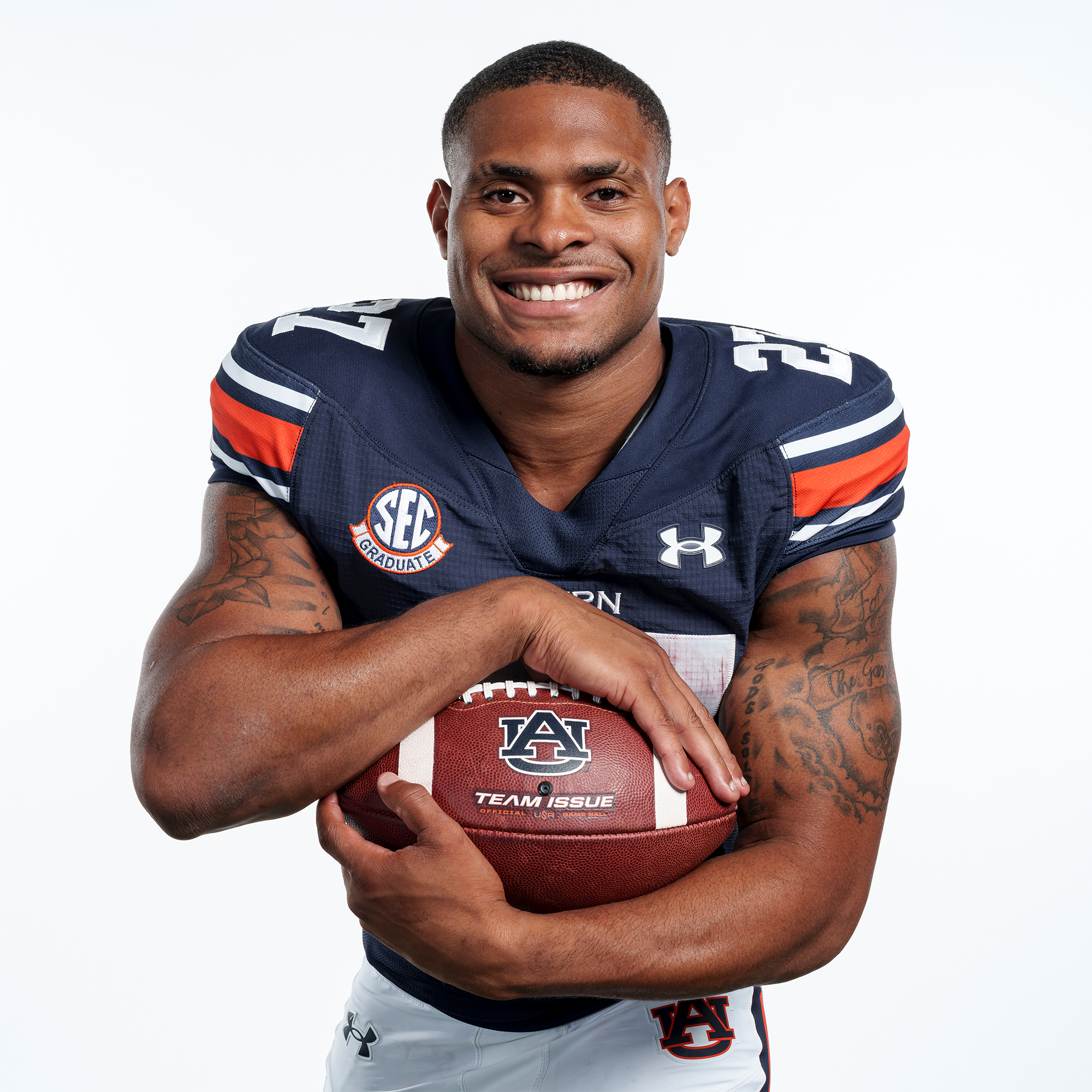 Jarquez Hunter posing in the new Under Armour uniform template. Details of the template and changes are detailed on the Auburn Uniform Database.