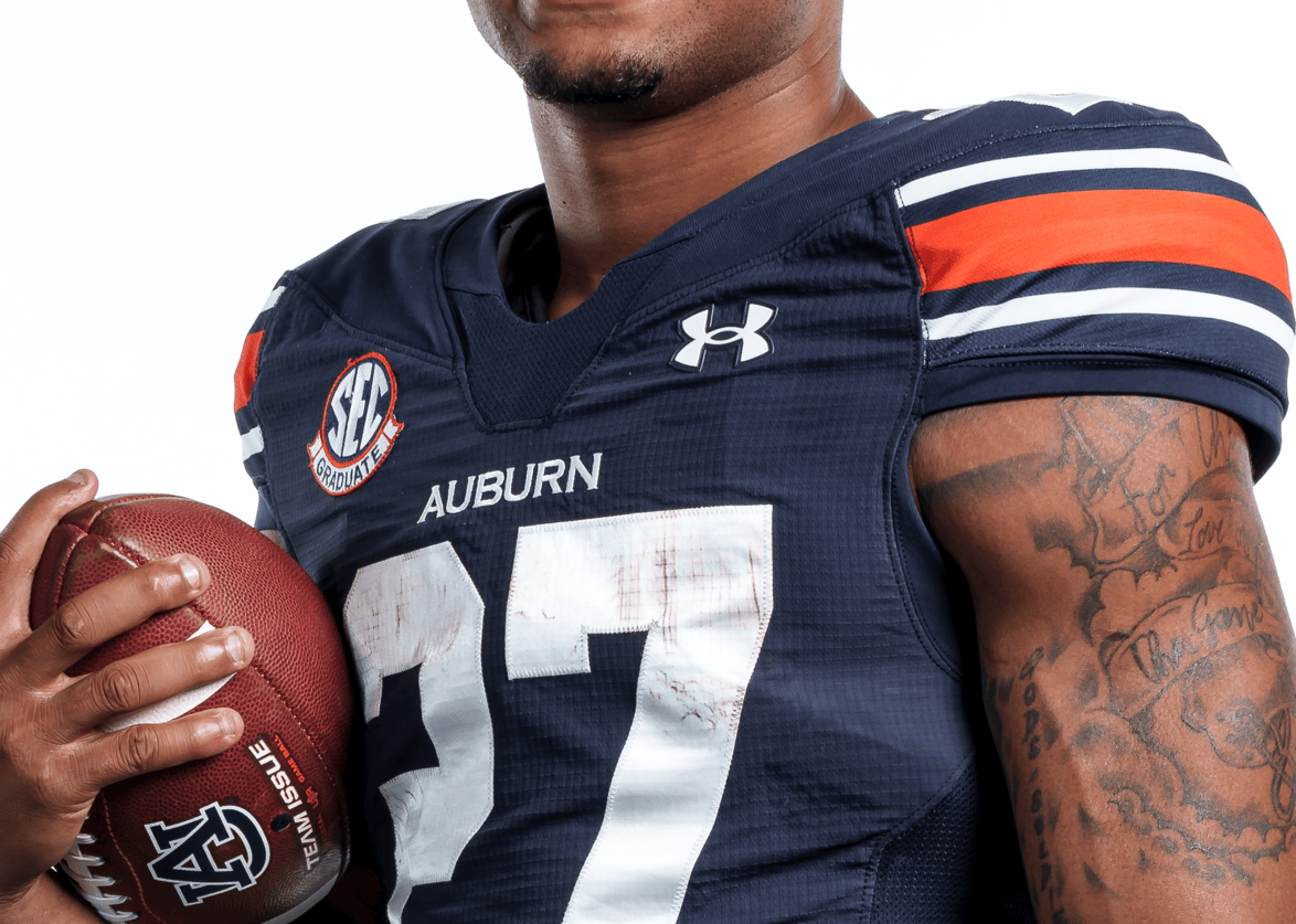 Jarquez Hunter posing in the new Under Armour uniform template. Details of the template and changes are detailed on the Auburn Uniform Database.